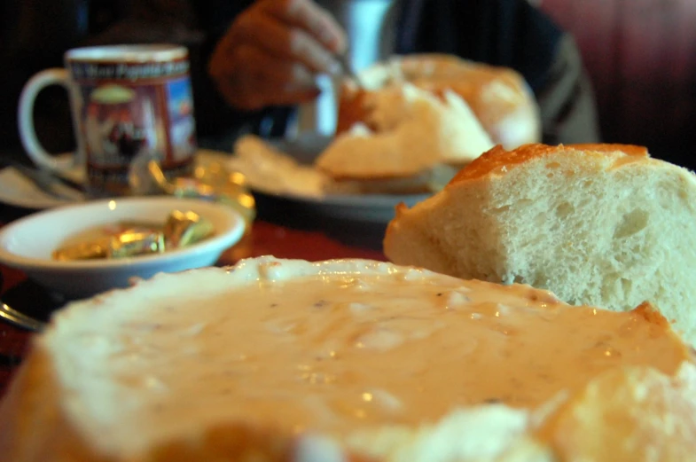 a close - up of two plates of food and coffee