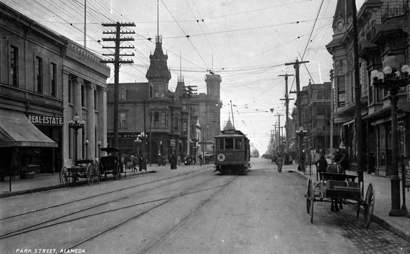 an old tram car on the tracks moving down a city street