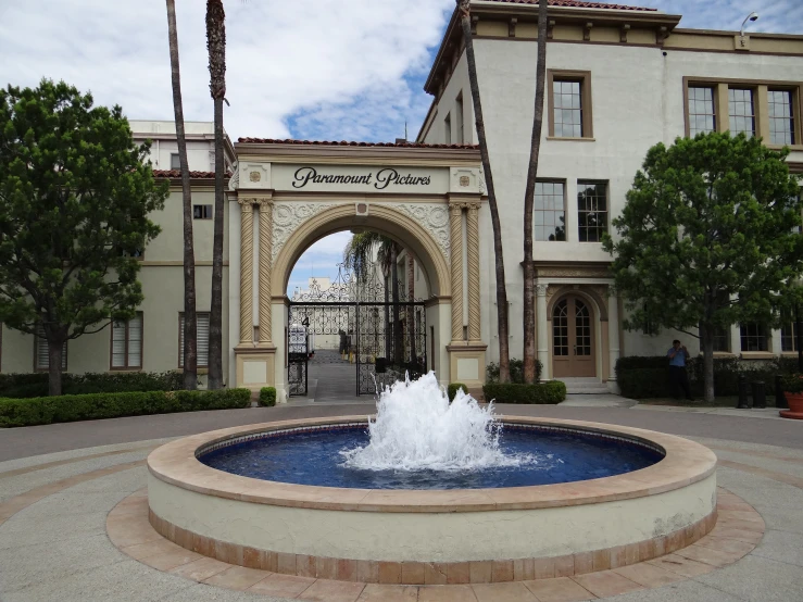 a fountain with some water in it outside