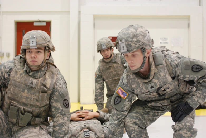 soldier in uniform holding their hands together