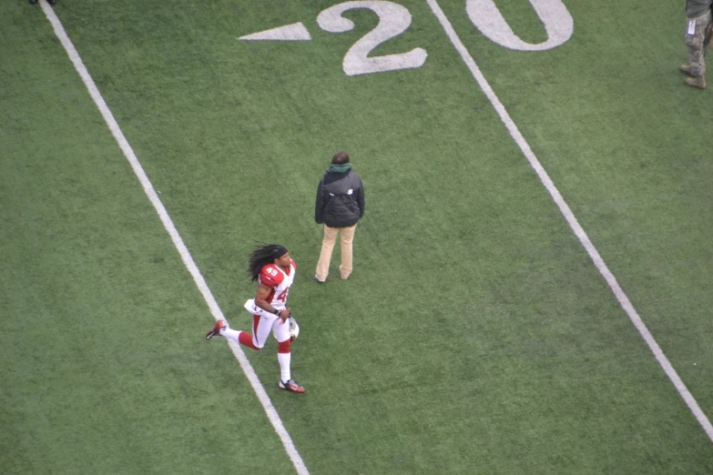 an image of a football game with players on the field