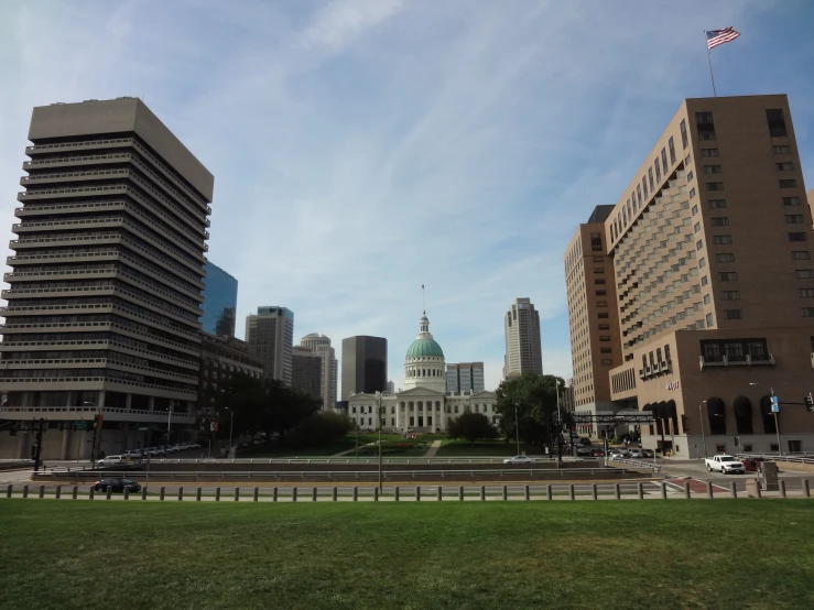 city skyline on a sunny day, including tall buildings