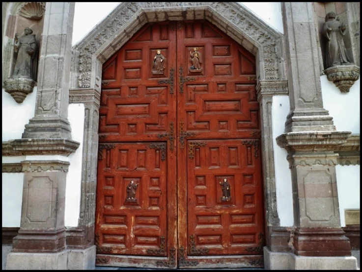 the ornate entry door to an old church