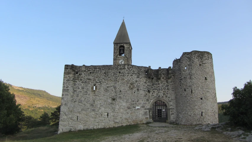 the tower of an old castle is visible