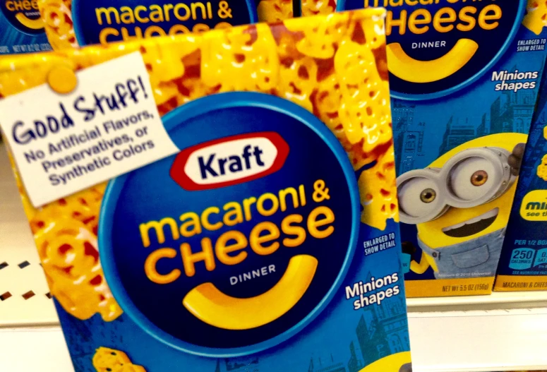 macaroni and cheese packs displayed on shelf in store