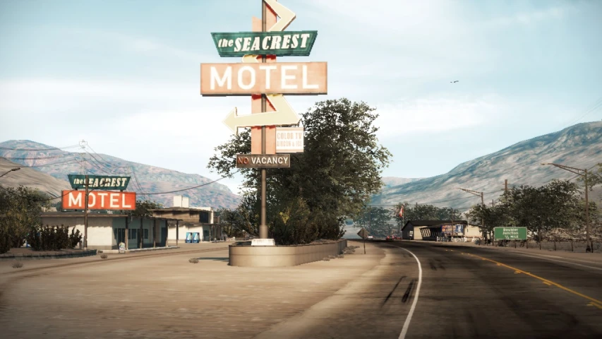 a road sign is pointing to different motels