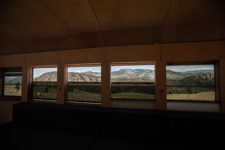 the mountains outside are seen in the windows