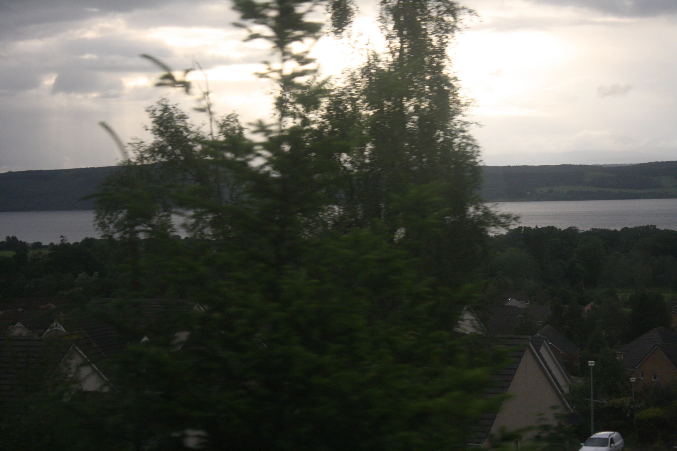 a city view of the water from across the yard