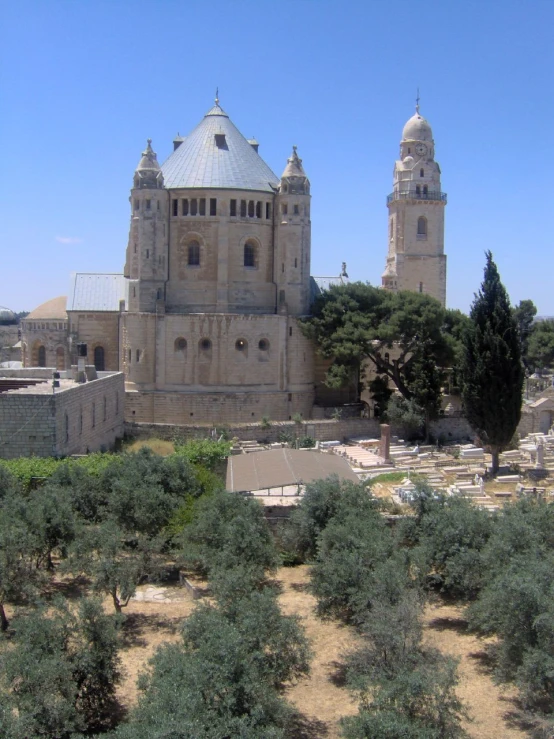 the building is very large and features domes