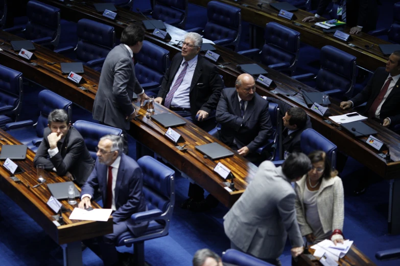 business men at work in the middle of a room