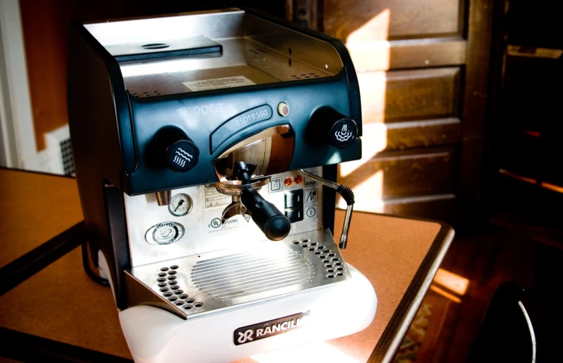 a small machine sitting on top of a table