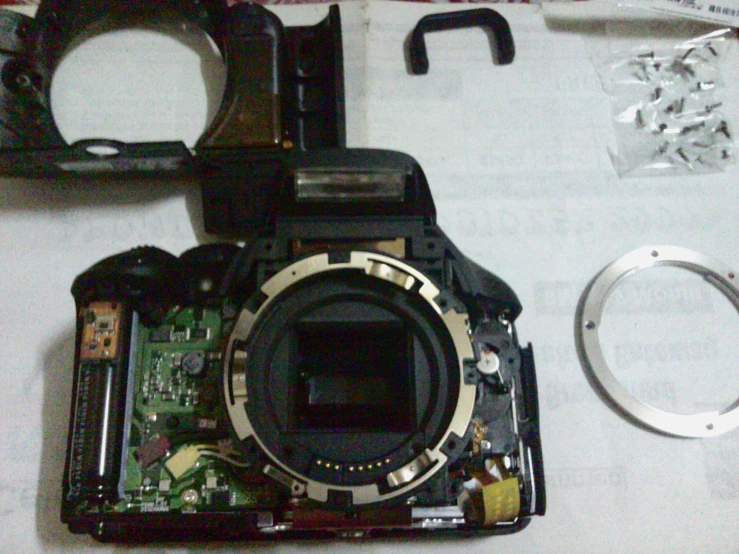 a camera is set up with its reflection and tools