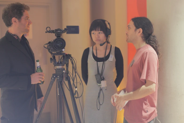 a camera set up behind a woman on the street