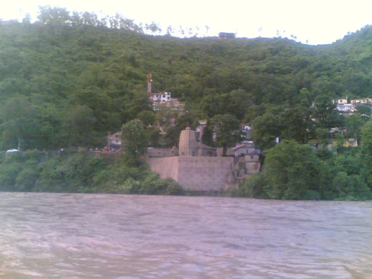 the castle in the lake is being built in the hillside area