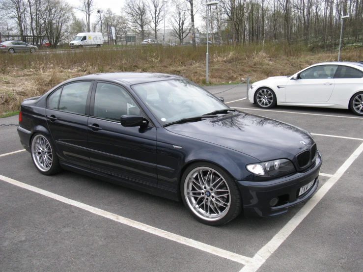 a bmw car parked in a parking spot in a parking lot