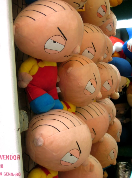 many different stuffed toys are on display for sale