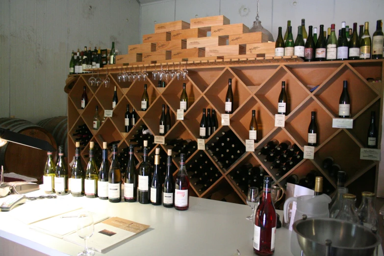 several bottles of wine are arranged on a table