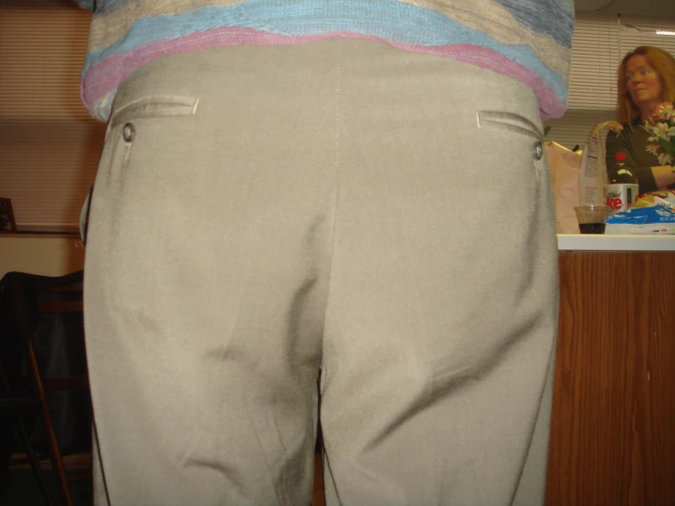 a person's pants that is showing the back end of it