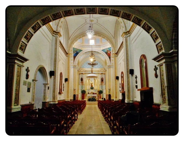 an archway in the inside of a church