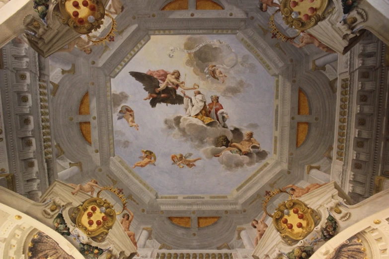 an elaborate ceiling painting with an eagle and a dove