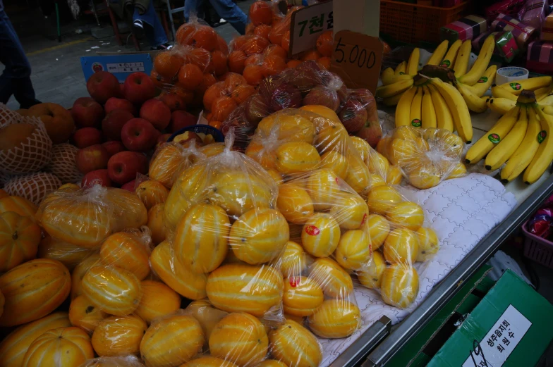 many different types of food on display in bags