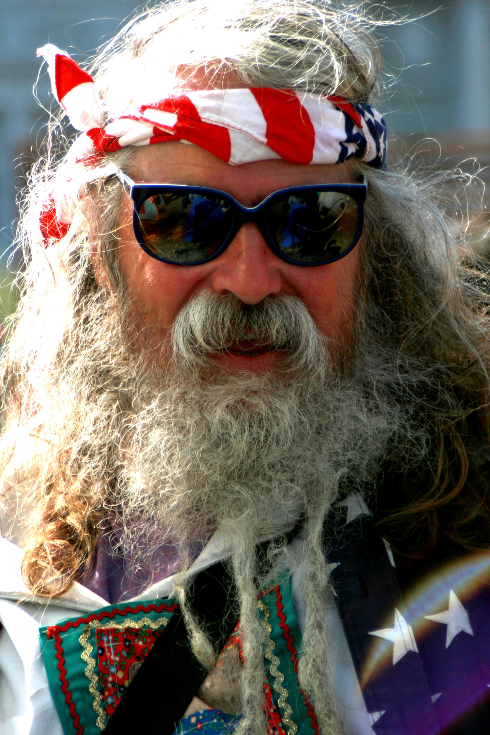 an old man dressed as a patriotic sailor