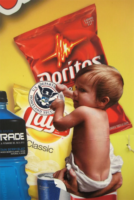 the baby is eating a potato chips advertit