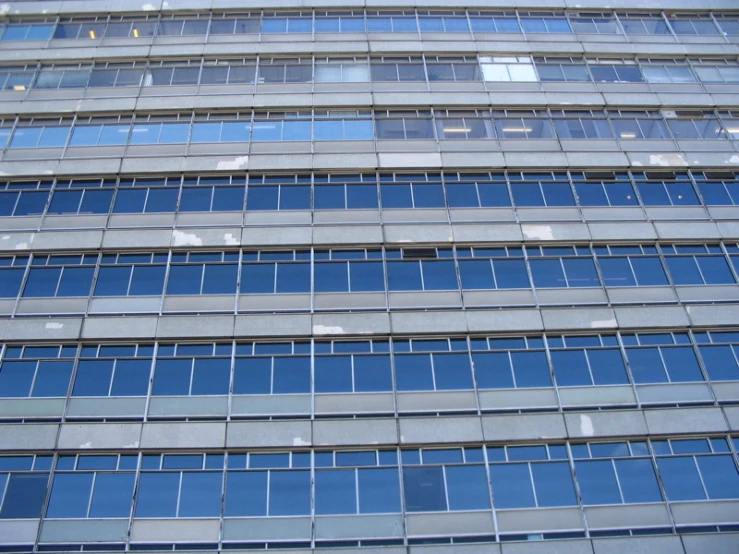 a closeup view of a tall building's front windows