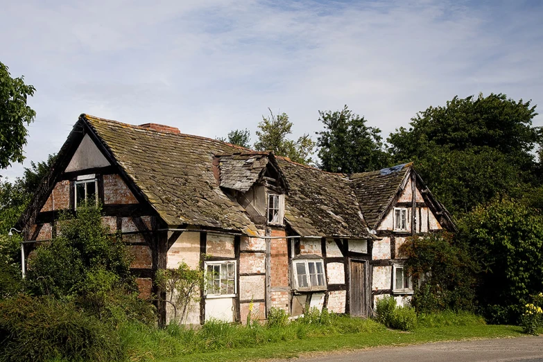 an old, rundown building has been converted into a house