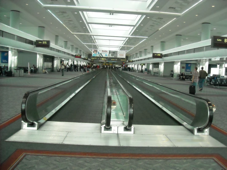 an empty baggage claim area at an airport