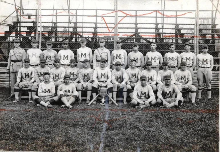 this is an old black and white pograph of baseball players