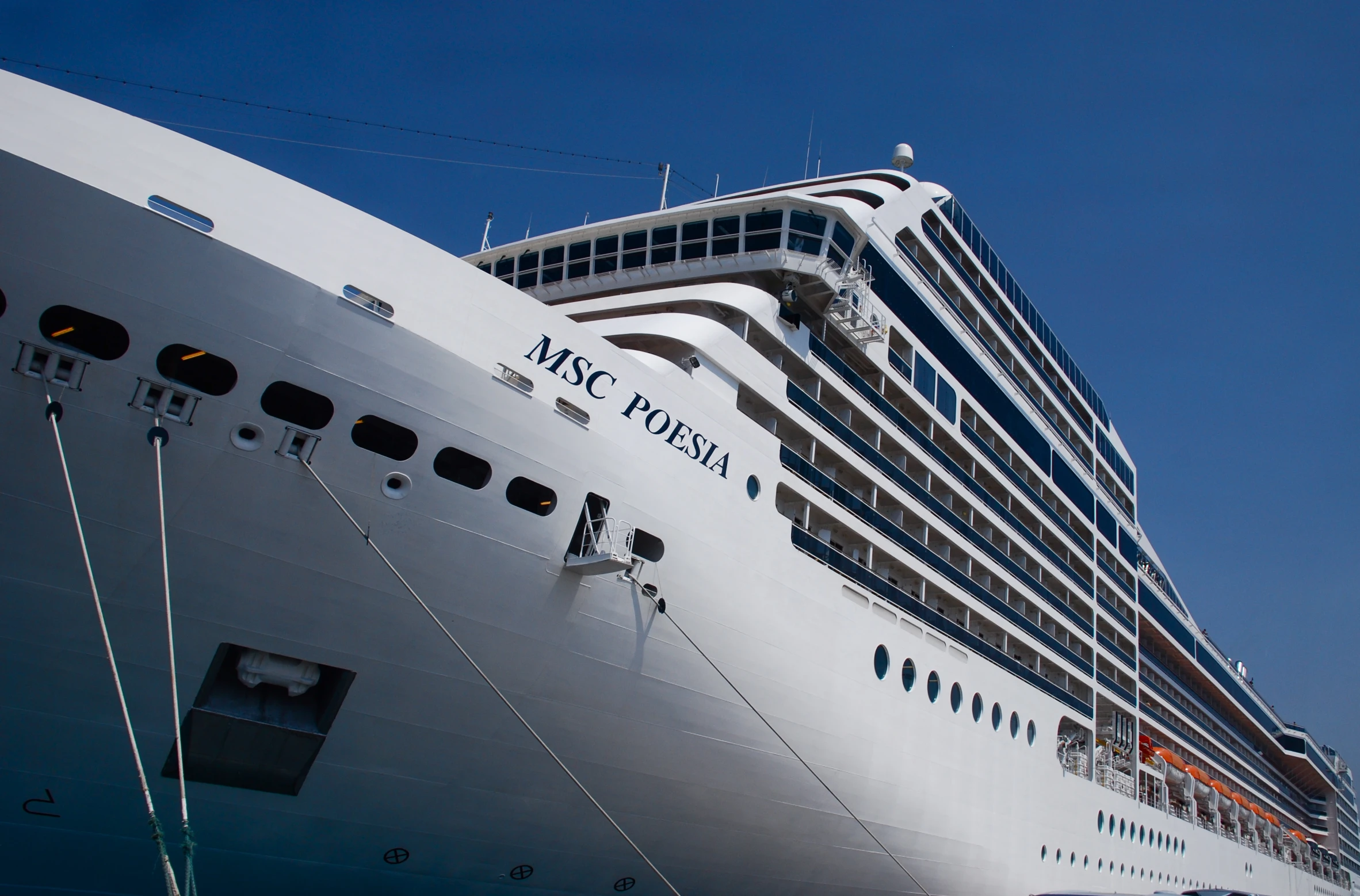 a large cruise ship docked in the harbor