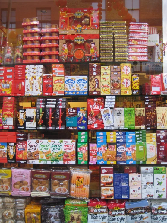 the food section of a store with display boxes and packages of snacks