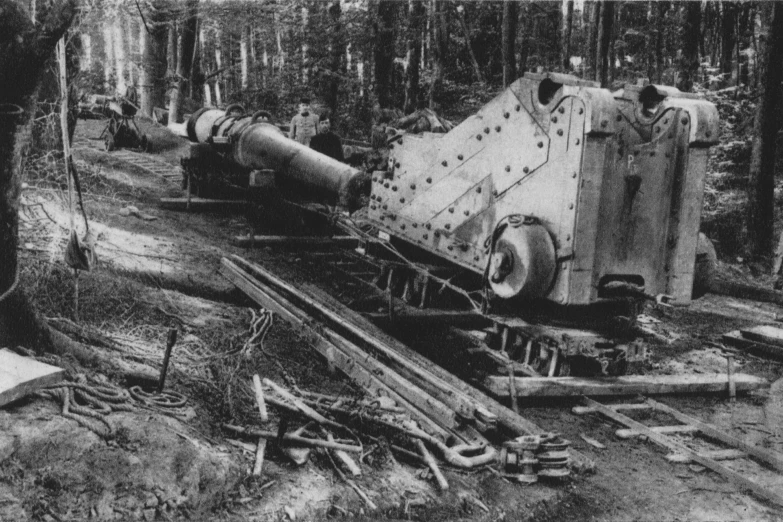 a black and white image of a logging machine