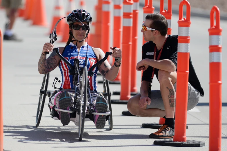 an individual is going down the course in a wheelchair