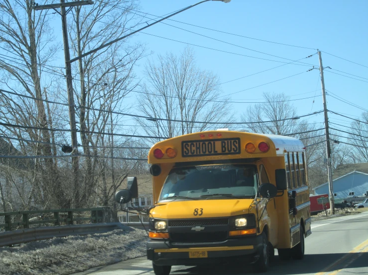 the back end of a school bus in traffic