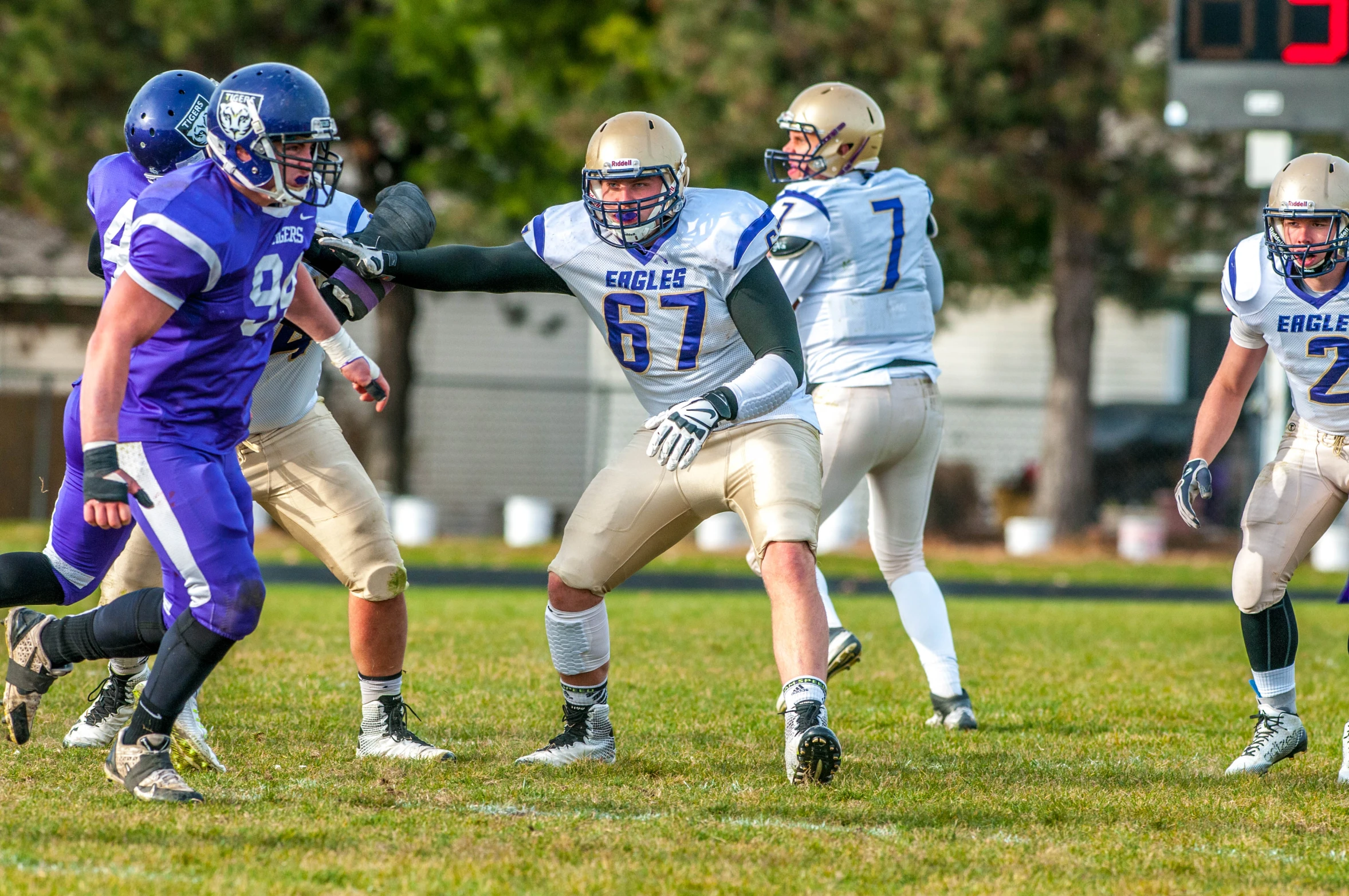 a football game is being played in a green field