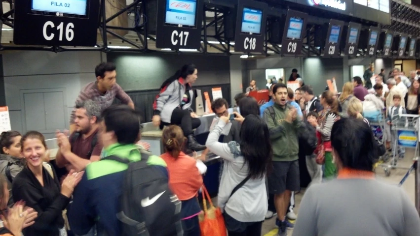 the people are waiting to enter the plane at the station