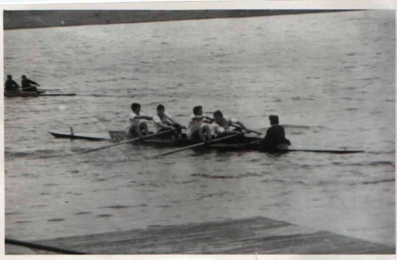 a po of some rowers on water