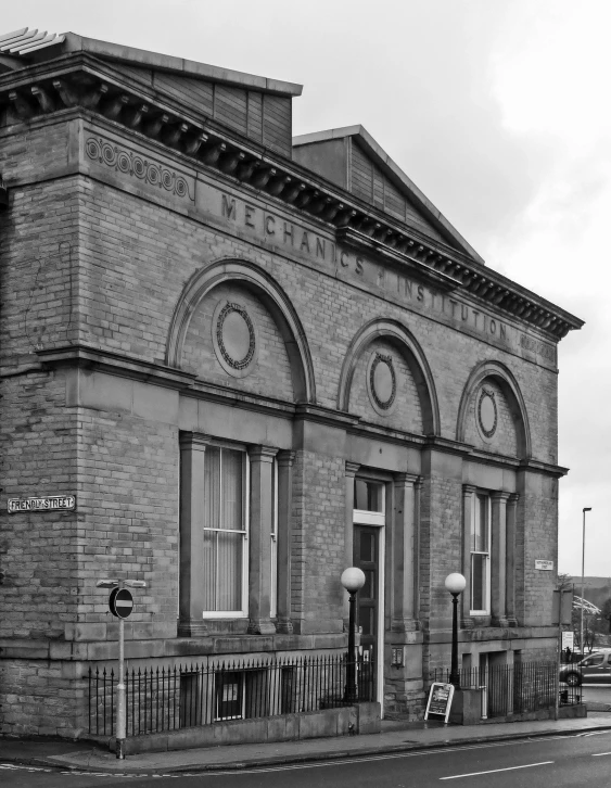 a brick building with windows and several windows