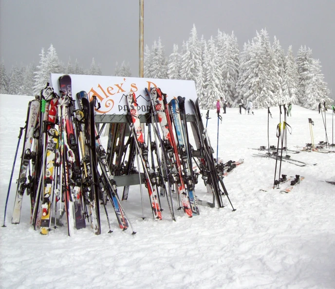 a number of different kinds of skis in the snow