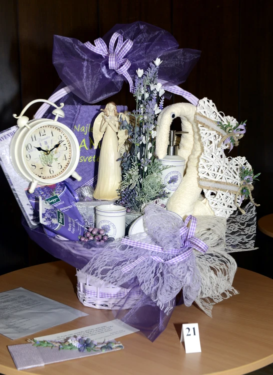 a purple basket with some stuffed animals inside