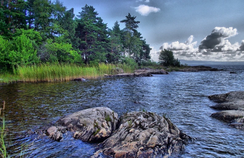 this is an impression of the rocky shoreline of a lake