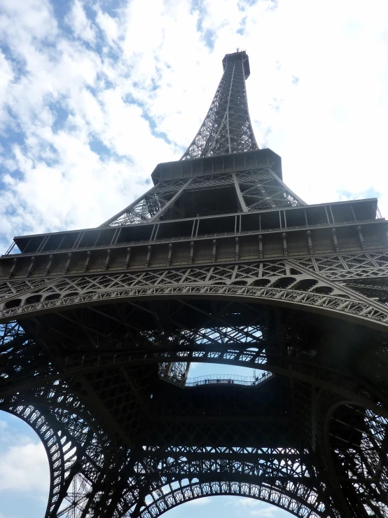 a view of the side of the tower from below