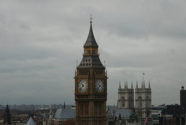 the clock tower has two clocks attached