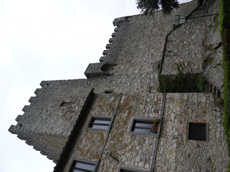 the castle has three windows and one balcony