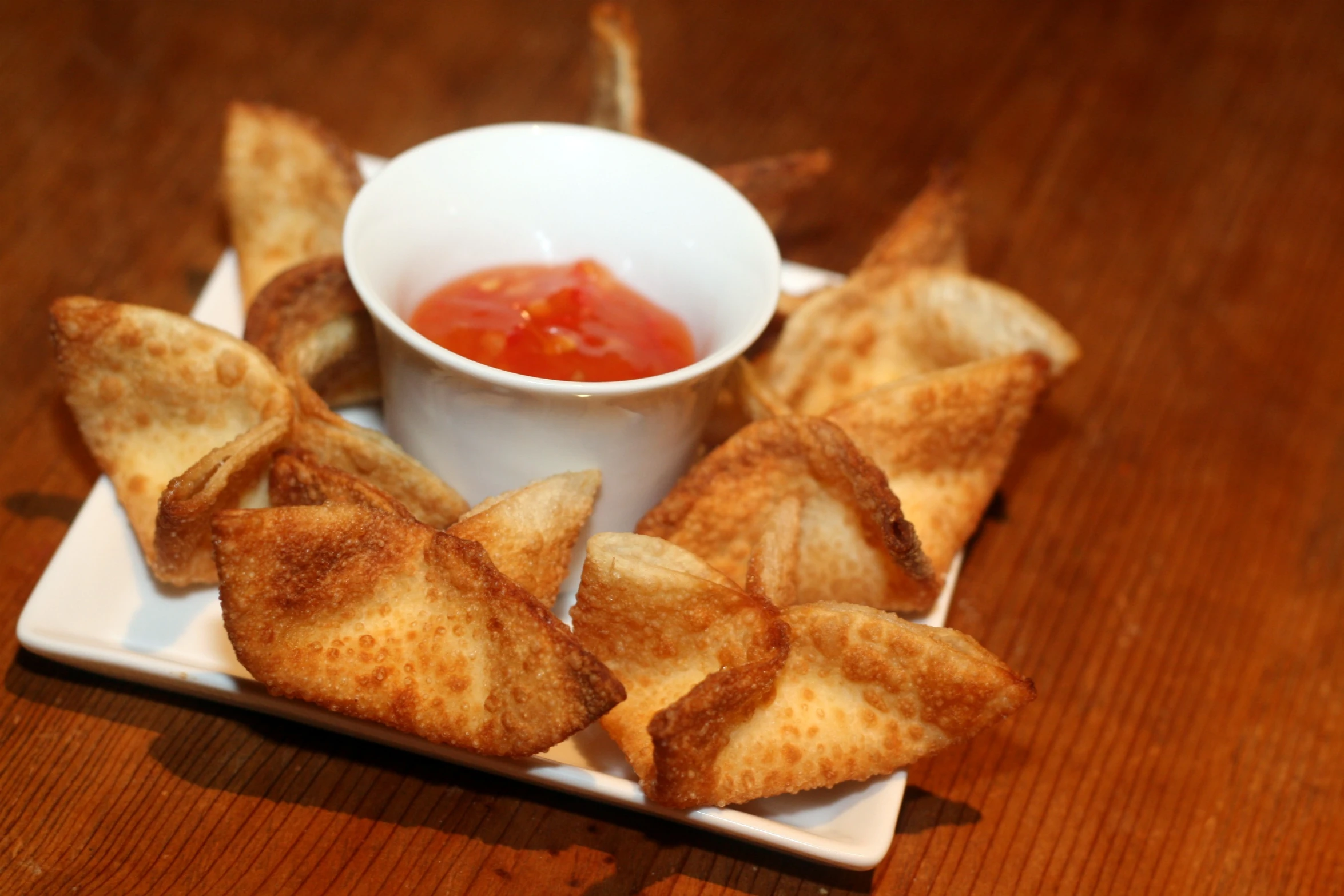 some small snacks sitting on top of a white plate