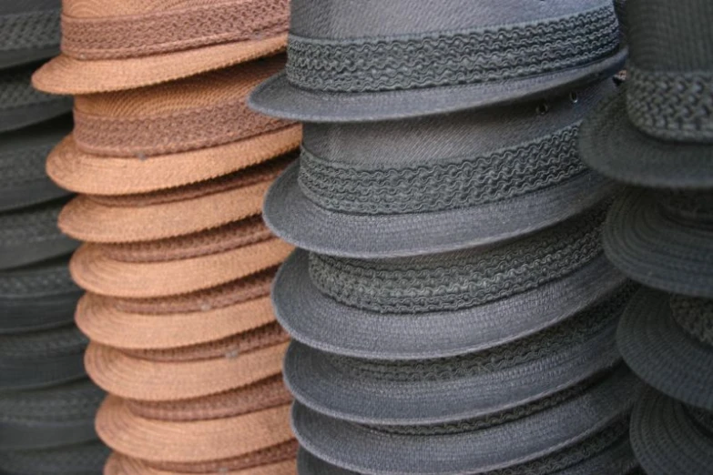 rows of hats in a row on a table