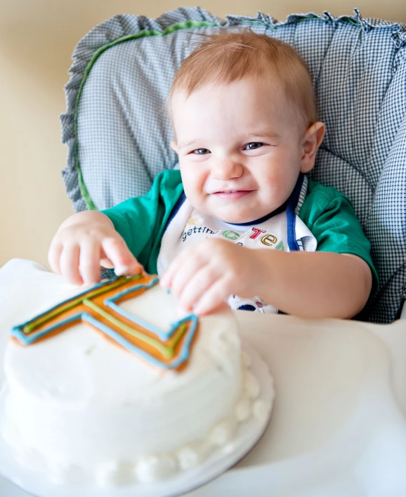 baby sitting in highchair getting ready to eat