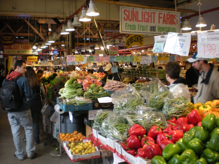 a farmer's market with a large selection of vegetables